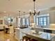 Open-concept kitchen with a breakfast bar, stainless steel appliances, and hardwood floors at 1813 Baldwin Farms Dr, Marietta, GA 30068