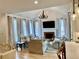 Comfortable living room with a fireplace, plush seating, and plenty of natural light at 1813 Baldwin Farms Dr, Marietta, GA 30068
