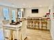 Recreation room with a kitchen, table with chairs and a countertop with stools at 1813 Baldwin Farms Dr, Marietta, GA 30068