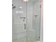New shower features white subway tiles, glass door, bench, and a built-in shelf at 1813 Baldwin Farms Dr, Marietta, GA 30068