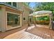 Expansive wooden deck with canvas gazebo, offering a serene outdoor space for relaxation and enjoyment at 2316 Fripp Overlook Nw, Acworth, GA 30101