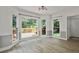 Dining area with wainscoting, hardwood floors, and lots of windows for natural light at 2316 Fripp Overlook Nw, Acworth, GA 30101