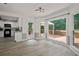 Dining area with hardwood floors, open to the kitchen, and access to the outdoor deck at 2316 Fripp Overlook Nw, Acworth, GA 30101