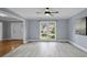 Bright, open living room with stylish flooring and a large window showcasing the neighborhood at 2316 Fripp Overlook Nw, Acworth, GA 30101