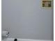 Wall with electrical outlets and a receptacle with a white plastic bag on the floor at 2316 Fripp Overlook Nw, Acworth, GA 30101