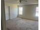 Spacious bedroom with multiple windows providing plenty of natural light at 730 Georgetown Ln, Jonesboro, GA 30236