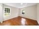 Neutral bedroom with hardwood flooring, natural light and relaxing atmosphere at 2179 Mountclaire Ct, Stone Mountain, GA 30087