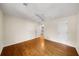 Bedroom featuring hardwood flooring and white ceiling fan at 2179 Mountclaire Ct, Stone Mountain, GA 30087
