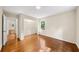 Bright bedroom with hardwood floors and large window overlooking the yard at 2179 Mountclaire Ct, Stone Mountain, GA 30087