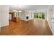 Spacious living area features a fireplace, hardwood flooring, and large windows overlooking the yard at 2179 Mountclaire Ct, Stone Mountain, GA 30087