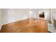 Bright living room with hardwood floors, fireplace, and views of the ensuite bathroom at 2179 Mountclaire Ct, Stone Mountain, GA 30087
