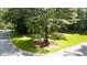 Street corner surrounded by mature shade trees with a 'Mountclair' street sign at 2179 Mountclaire Ct, Stone Mountain, GA 30087