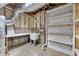 Unfinished basement area with open shelving, ductwork, and a utility sink at 420 Gold Xing, Canton, GA 30114