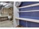 Basement area featuring open shelving, a utility sink, and exposed ductwork at 420 Gold Xing, Canton, GA 30114