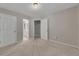 Bright bedroom with neutral walls, plush carpet, and access to an ensuite bathroom at 420 Gold Xing, Canton, GA 30114