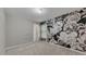 Stylish bedroom featuring a statement floral accent wall and neutral carpeting at 420 Gold Xing, Canton, GA 30114
