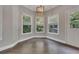 Charming breakfast nook with a bay window, wood floors, natural light, and backyard views at 420 Gold Xing, Canton, GA 30114