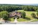 An impressive clubhouse surrounded by lush landscaping, providing a welcoming atmosphere for residents and guests at 420 Gold Xing, Canton, GA 30114