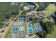 An aerial view of abundant community amenities including a pool, tennis courts, clubhouse, and parking at 420 Gold Xing, Canton, GA 30114