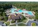 Aerial view of a luxurious community pool area with various swimming areas and amenities at 420 Gold Xing, Canton, GA 30114