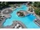 Stunning aerial view of community pools featuring unique water features, slides, and lounge areas at 420 Gold Xing, Canton, GA 30114