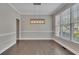 Spacious dining room featuring dark hardwood floors and a modern chandelier at 420 Gold Xing, Canton, GA 30114