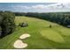Scenic view of the beautiful golf course, surrounded by verdant trees and featuring pristine greens and sand traps at 420 Gold Xing, Canton, GA 30114