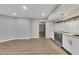 Modern kitchenette featuring stainless steel appliances, sleek cabinetry, and hardwood flooring at 420 Gold Xing, Canton, GA 30114