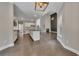 Open-concept kitchen and living room showcasing a fireplace, tall ceilings, and plenty of natural light at 420 Gold Xing, Canton, GA 30114