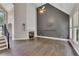 Spacious living room with a vaulted ceiling, modern fireplace, and large windows allowing natural light at 420 Gold Xing, Canton, GA 30114