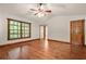 Large bedroom with hardwood floors, a ceiling fan, and natural light at 4211 Burnt Hickory Nw Rd, Marietta, GA 30064