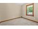 Cozy bedroom with neutral carpet and natural light from a large window at 4211 Burnt Hickory Nw Rd, Marietta, GA 30064