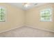 Cozy bedroom with natural light and a ceiling fan for added comfort at 4211 Burnt Hickory Nw Rd, Marietta, GA 30064