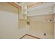 Walk-in closet with white walls, and several shelves for storage at 4211 Burnt Hickory Nw Rd, Marietta, GA 30064