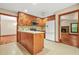 Bright kitchen featuring white appliances, wood cabinets, and an island at 4211 Burnt Hickory Nw Rd, Marietta, GA 30064