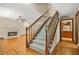 Inviting living room with a fireplace, hardwood floors and a staircase at 4211 Burnt Hickory Nw Rd, Marietta, GA 30064