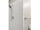 Shower with white tiles and silver fixtures at 4211 Burnt Hickory Nw Rd, Marietta, GA 30064