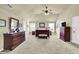 Spacious main bedroom features vaulted ceilings, carpet, and traditional furnishings at 4315 Balsam Bark Dr, Cumming, GA 30028