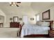 Spacious bedroom with carpet and a bed is complemented by side tables at 4315 Balsam Bark Dr, Cumming, GA 30028