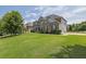 Charming two-story home with a large lawn and side-entry garage at 4315 Balsam Bark Dr, Cumming, GA 30028