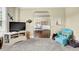 Cozy living room featuring an arched doorway and comfortable seating at 4315 Balsam Bark Dr, Cumming, GA 30028