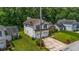 Charming two-story home with a well-maintained lawn, mature trees, and a two-car garage at 5485 Shirewick Ln, Lithonia, GA 30058