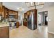 Well-lit kitchen with stainless steel appliances and granite countertops at 5485 Shirewick Ln, Lithonia, GA 30058