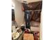 Untidy bathroom with shower/tub, toilet, sink, and open ceiling covered with tarps at 590 Killian Rd, Canton, GA 30114
