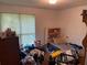 Bedroom featuring a small bed and dresser at 590 Killian Road Rd, Canton, GA 30114