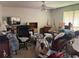 Spacious bedroom featuring a ceiling fan, window, and ample space for furniture, though it needs decluttering at 590 Killian Road Rd, Canton, GA 30114