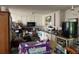 Kitchen featuring white cabinets and black appliances at 590 Killian Road Rd, Canton, GA 30114