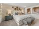 Spacious main bedroom with neutral tones, patterned pillows, and soft lighting at 221 Paisley Way, Locust Grove, GA 30248