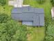 Bird's-eye view of a house featuring a dark gray roof and an expansive gray deck at 4720 Hull Rd, Conyers, GA 30094