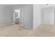 Large bedroom with plush carpet, closet and full bathroom off to the side at 4720 Hull Rd, Conyers, GA 30094